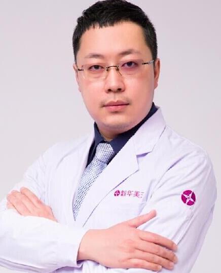 賀任重