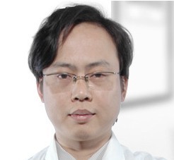 譚進